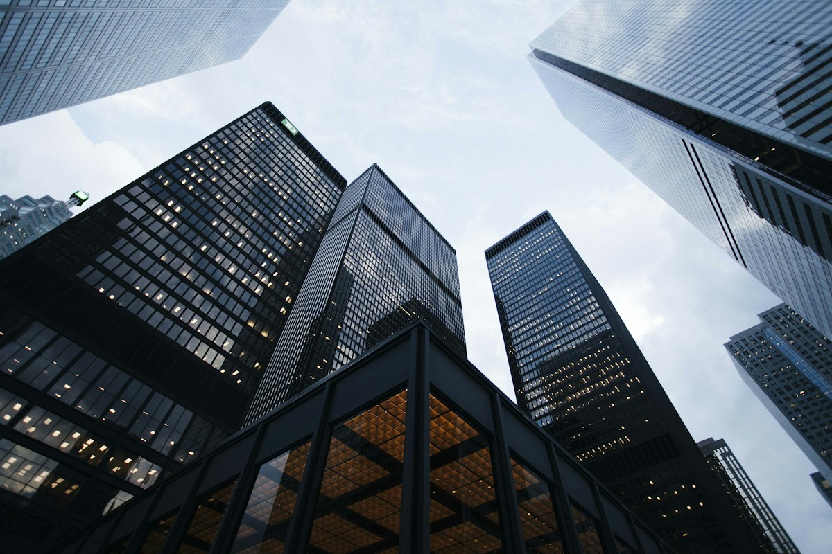 Modern glass buildings viewed from below